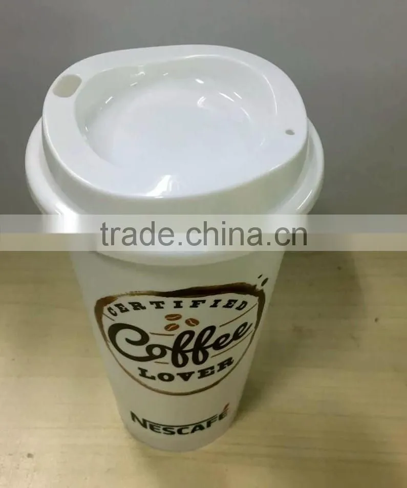 Hot and cold Plastic travel coffee cup with lid and silicone band