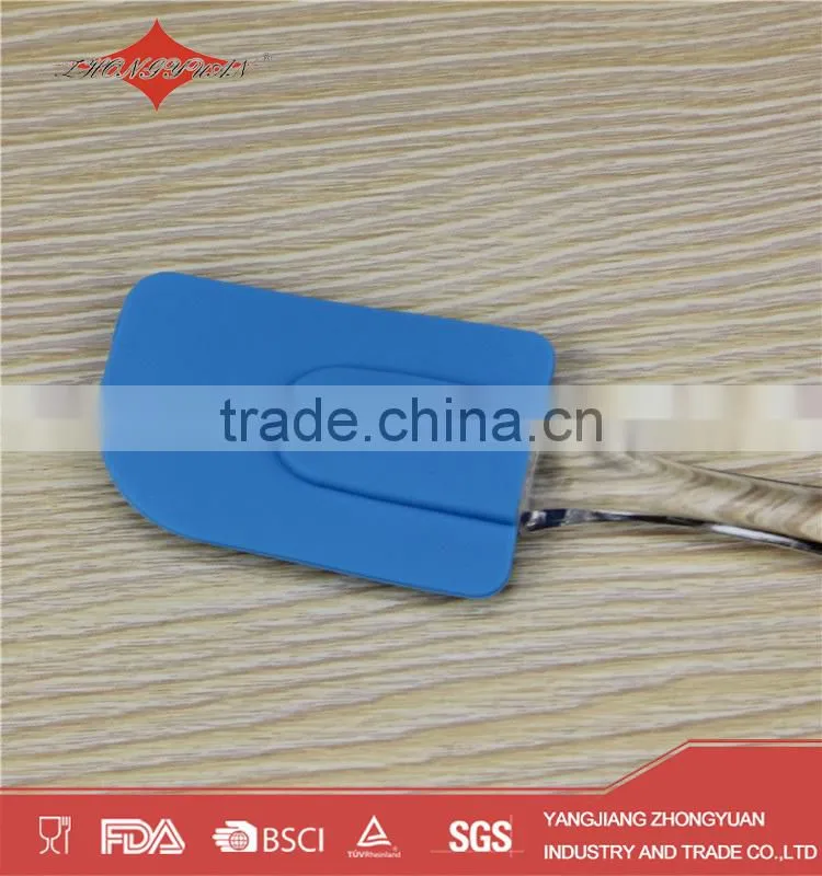 blue silicone spatula with plastic handle