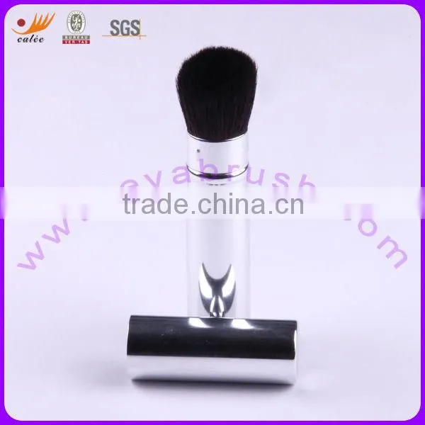 Retractable brush cosmetic with diamond design