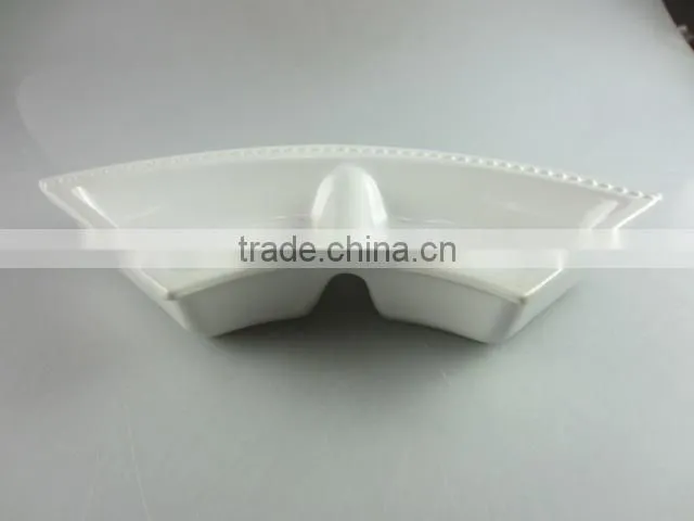 stocked white ceramic rectangle French fries serving plate with dipping dish and iron stand