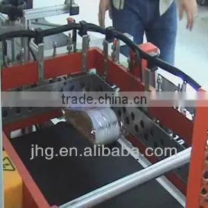 Automatic L bar shrink wrapping machine