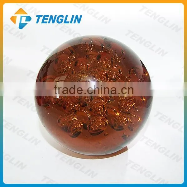 Handmade glass ball paperweight with bubble