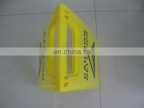 yellow warning sign used in wet floor
