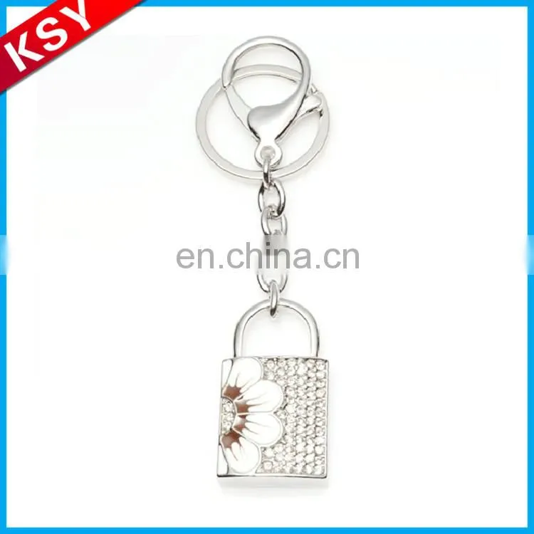 polished nickel key shape keychain