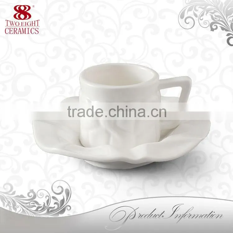 Wrinkled white ceramic embossed coffee cup and saucer