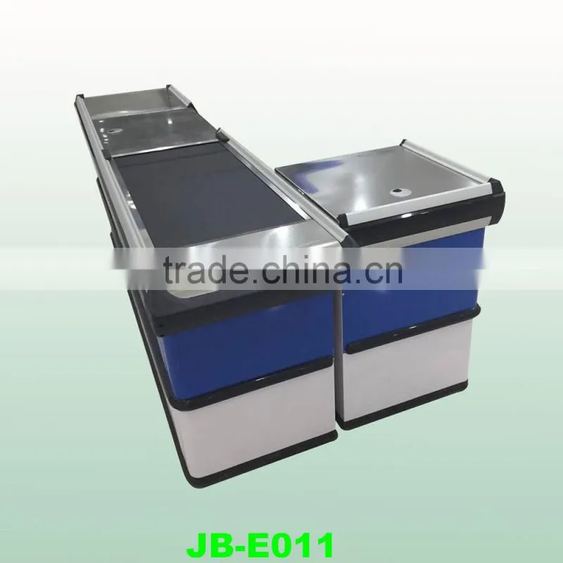 stainless steel checkout counter used in supermarket