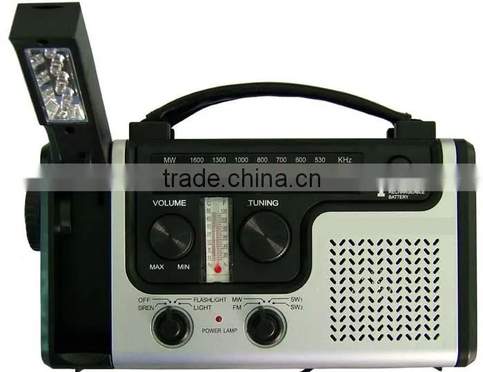 Hand rechargeable with flashlight radio