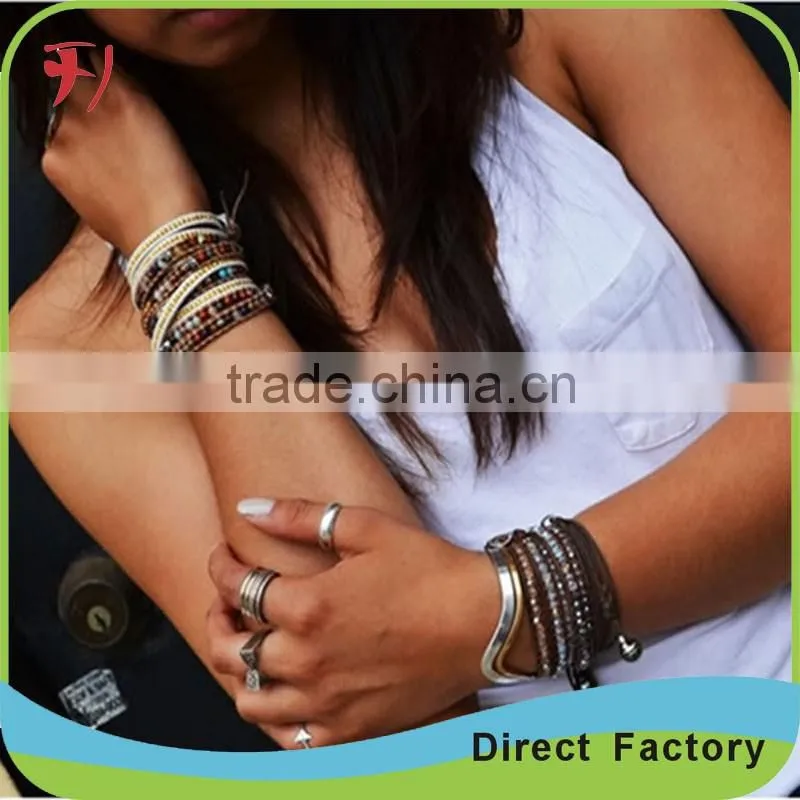 White And Brown Crystal Mix Wrap Bracelet On Contrasting Brown Leather With A Stainless Steel Clasp