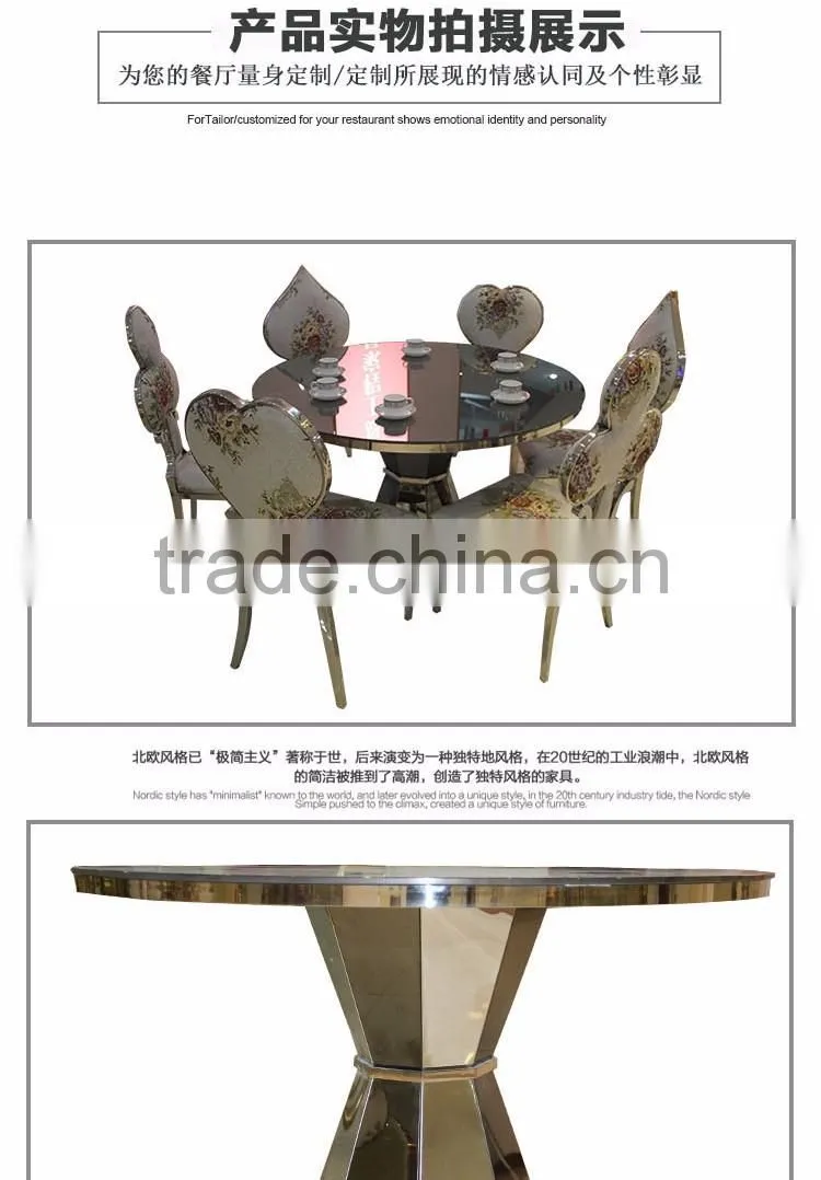 Upholstered stainless steel goldedn glass surface table for sale