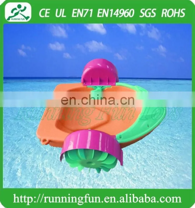 Kids plastic boats, handing paddle boats