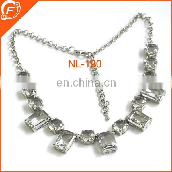 women dressing metal chain necklace with tubes