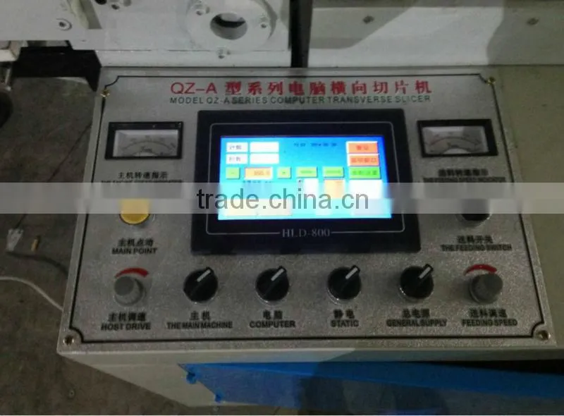 Economic type cake or bread oil on paper roll to sheets cutting machine