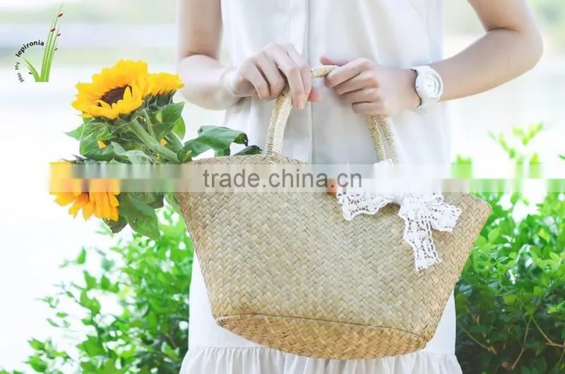 Seagrass beach bag with seashell decoration, cool design for summer holiday