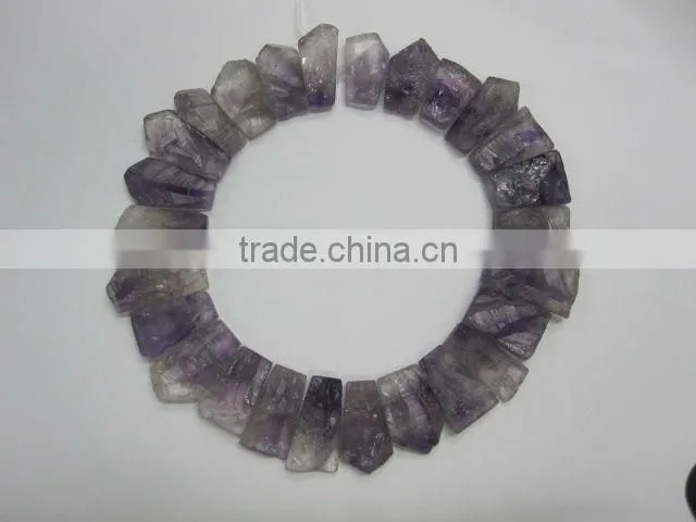 rainbow amethyst rough coin