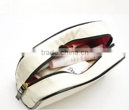 Dazzling PVC zipper closure cosmetic bag with black trim and decorations