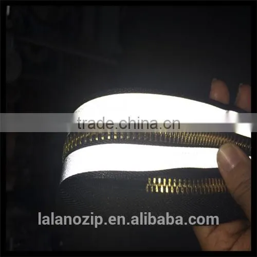 TPU wholesale clothing with brass reflective zipper