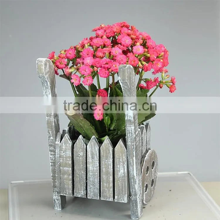Small wooden flower pot and garden planter