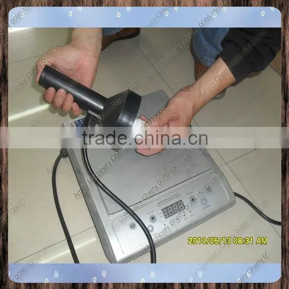 2014 low price electromagnetic induction aluminum foil sealing machine