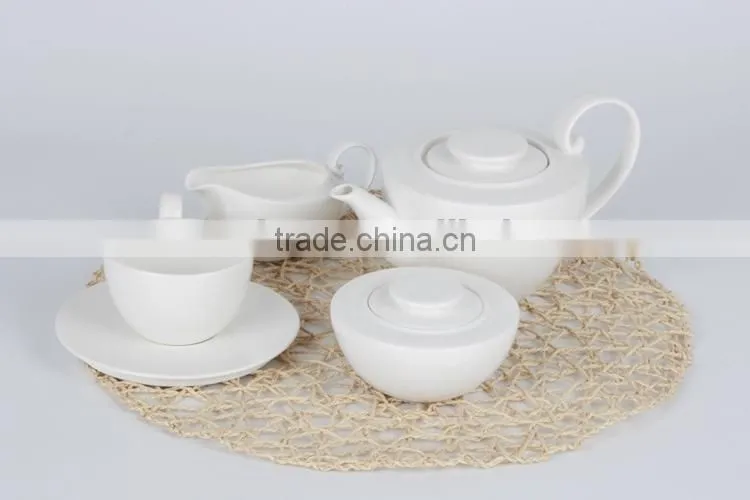 delicate fine porcelain coffee cup with saucer