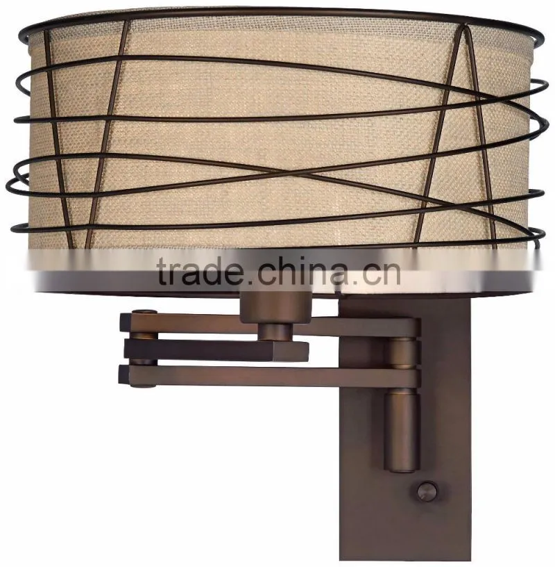 1031-1 wire cage detail surrounds a burlap shade a rich Bronze Metal Swing Arm Wall Lamp