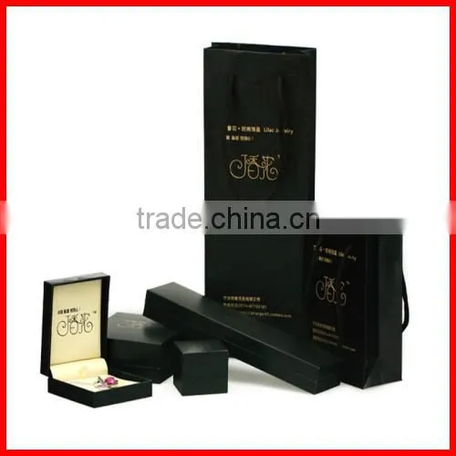 luxury elegant black plastic jewelry box with silver logo and velvet insert