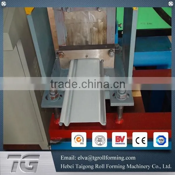 Precoated plate rolling shutter door forming machine