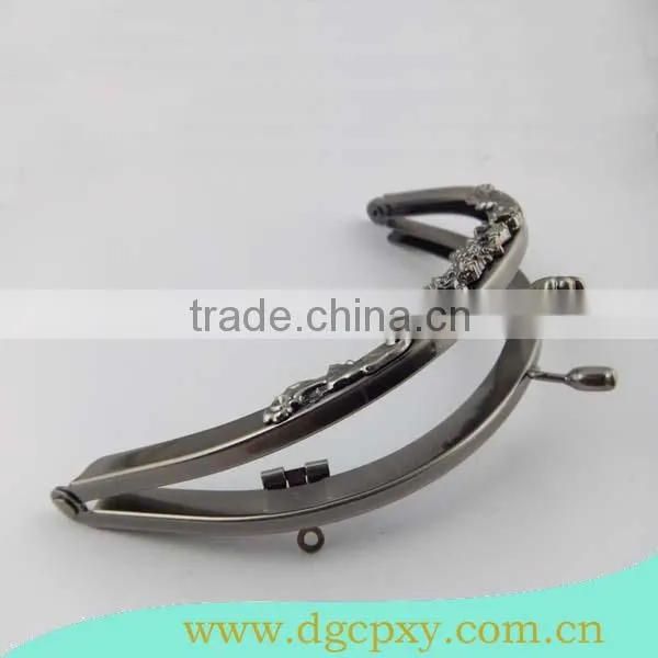 gunmetal round shape frame with flower carved pattern and flower kiss lock