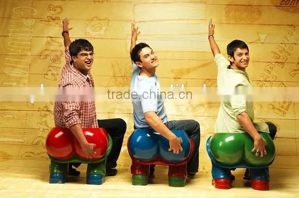 three idiots ass shaped public chair sculpture