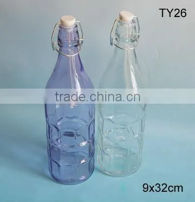 2016 cylinder beautiful glass bottle with embossing with clip lid