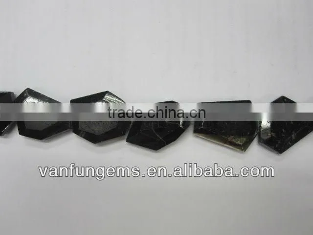 Black tourmaline faceted tumble stone