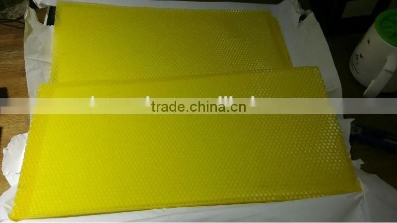 factory making beeswax foundation sheet