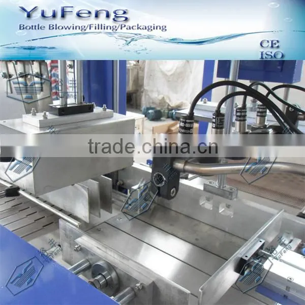 Automatic thermal shrink packing machine for shrinking bottles and boxes