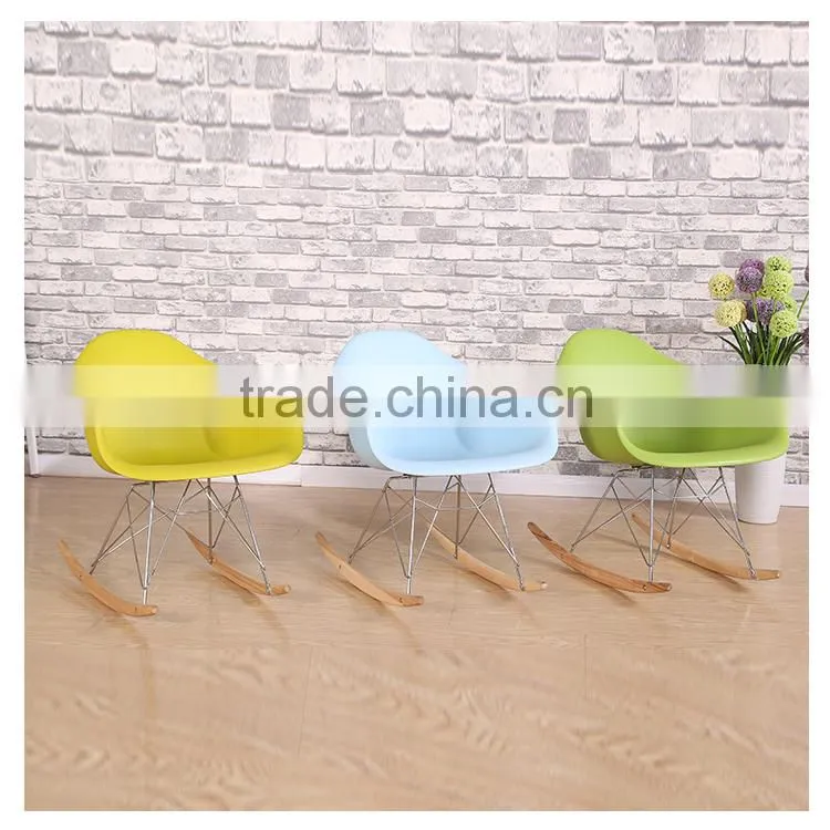Plastic rocking dining chairs with armrests