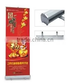 Portable roll up banner stand