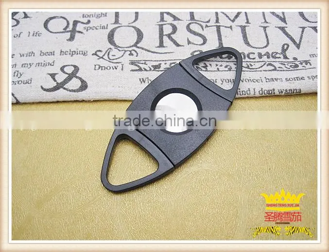Plastic double blade cigar cutter with a 54 ring gauge