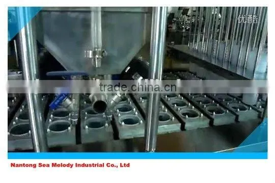 Curd cup sealing machine