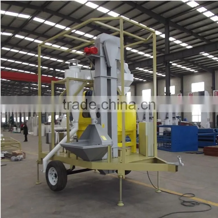 combined seed processing machine with rotary seed cleaner and seed treater