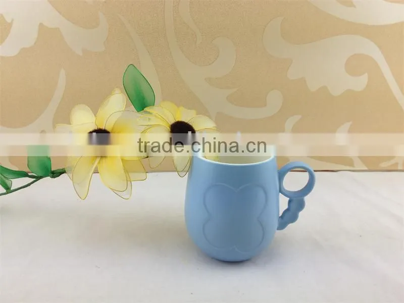 round handle embossed butterfly ceramic cup