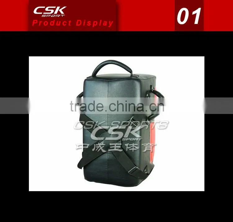Coach training boxing punching pad