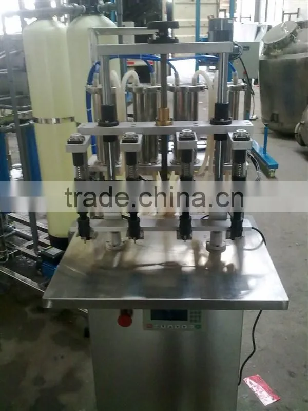 2015 JF New high precision automatic liquid filling machine/ perfume, oil, cosmetic toner, milk, juice liquid filling