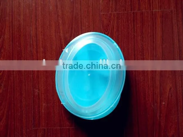 plastic round salad bowl with fork