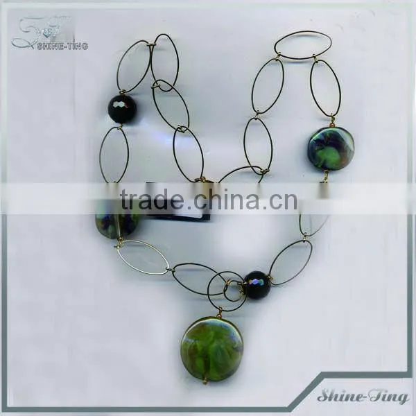 luxurious chain necklace with red gemstone charm pendant