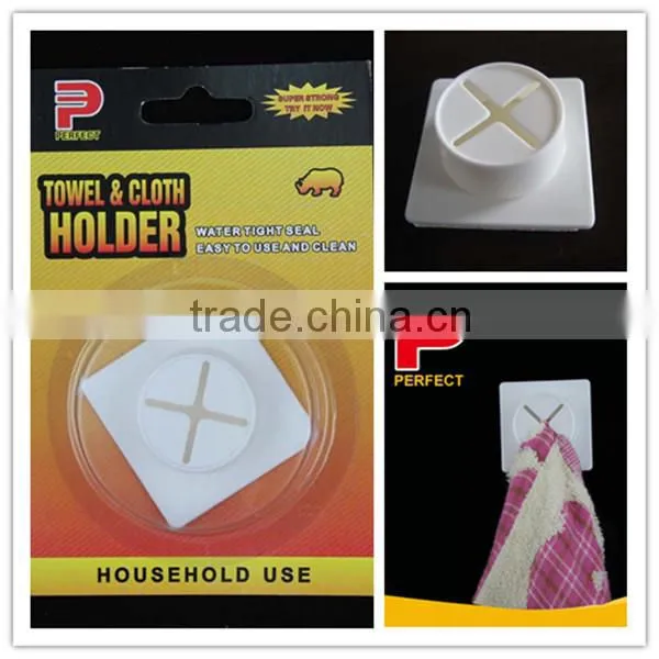 Removable self adhesive plastic towel grip