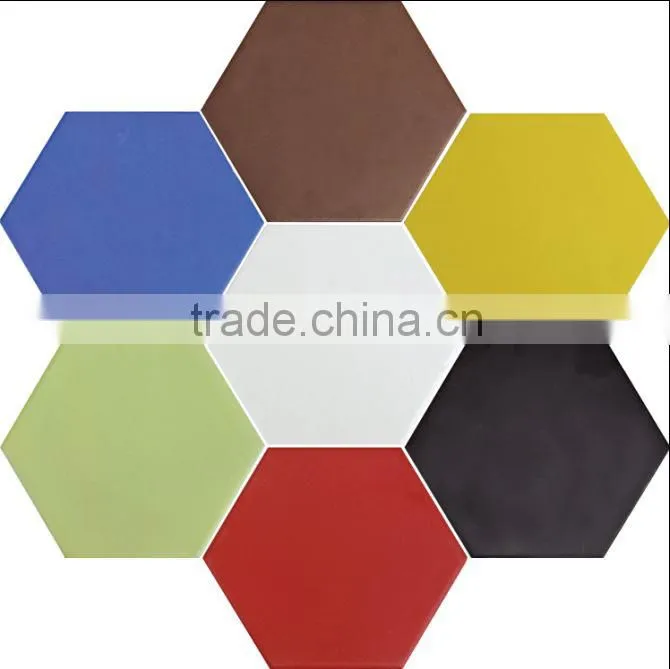 green ceramic tile with flower design
