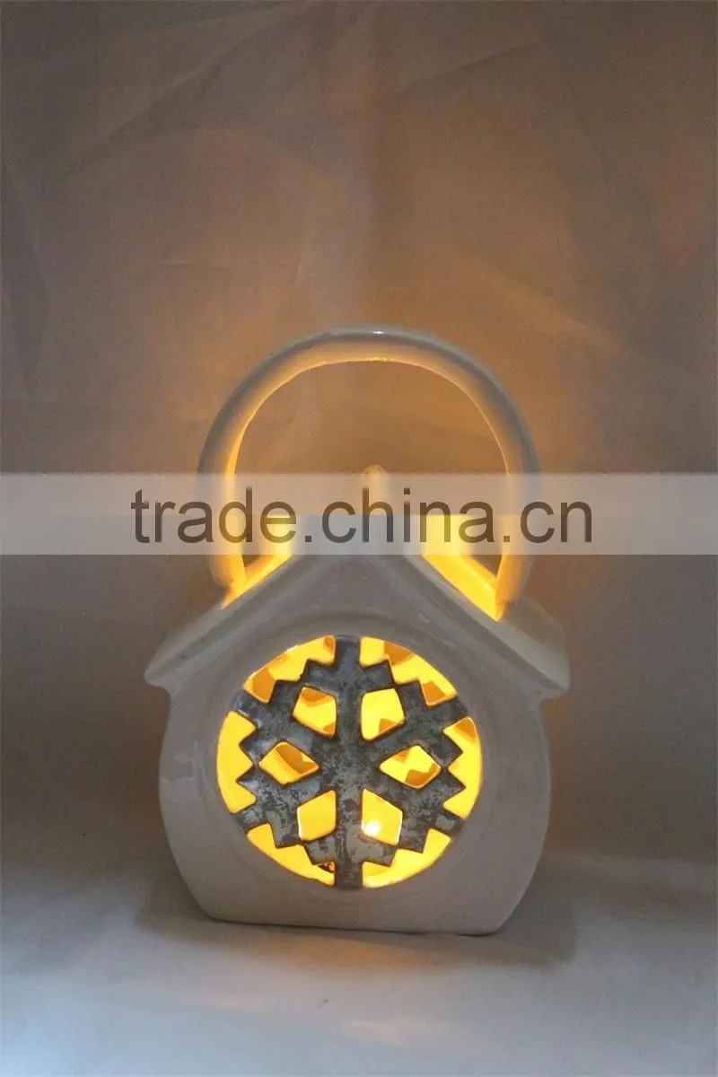 White ceramic owl shaped tealight candle holder