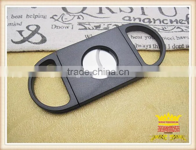 Plastic double blade cigar cutter with a 54 ring gauge