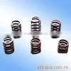 Compression spring shock absorber