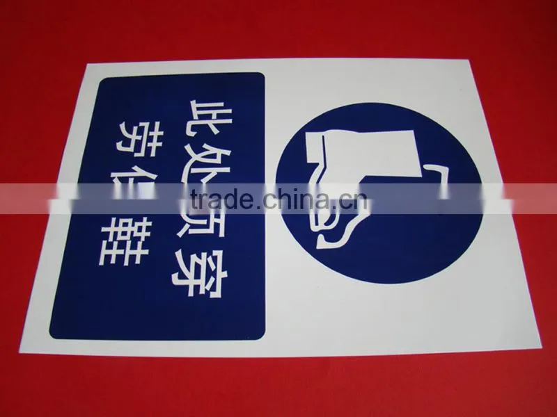 hanging construction sign with holes