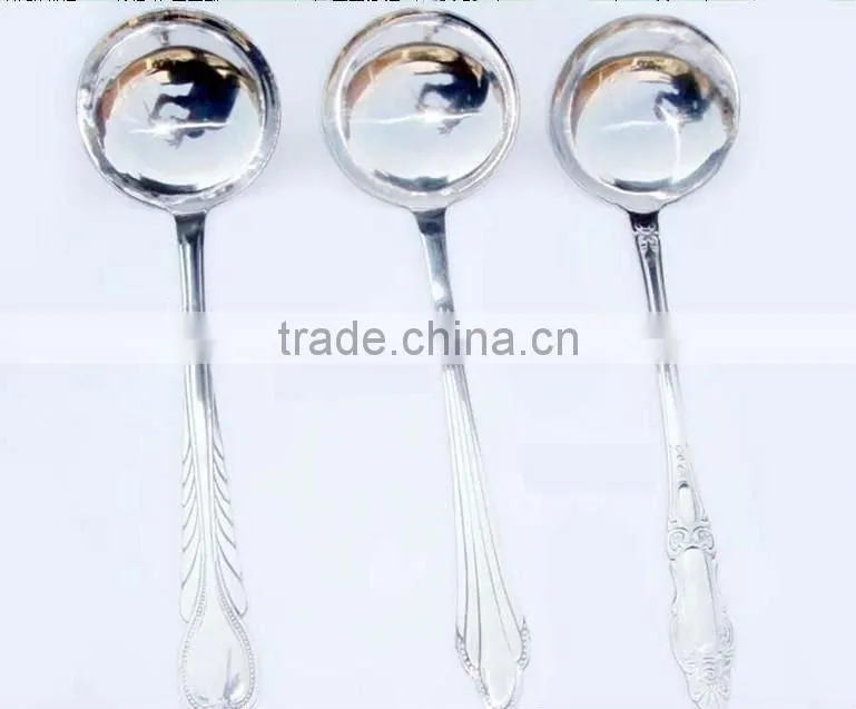 long-handled stainless steel spoon with flower design handle