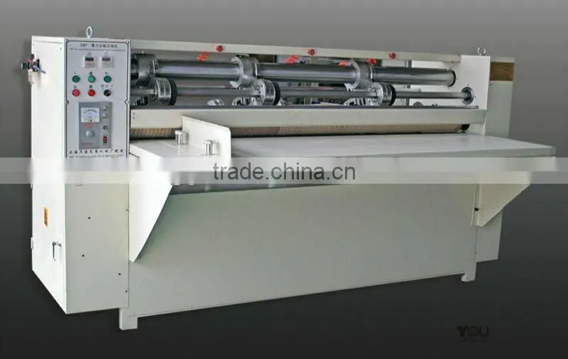 Automatic corrugated paperboard slitting scorer